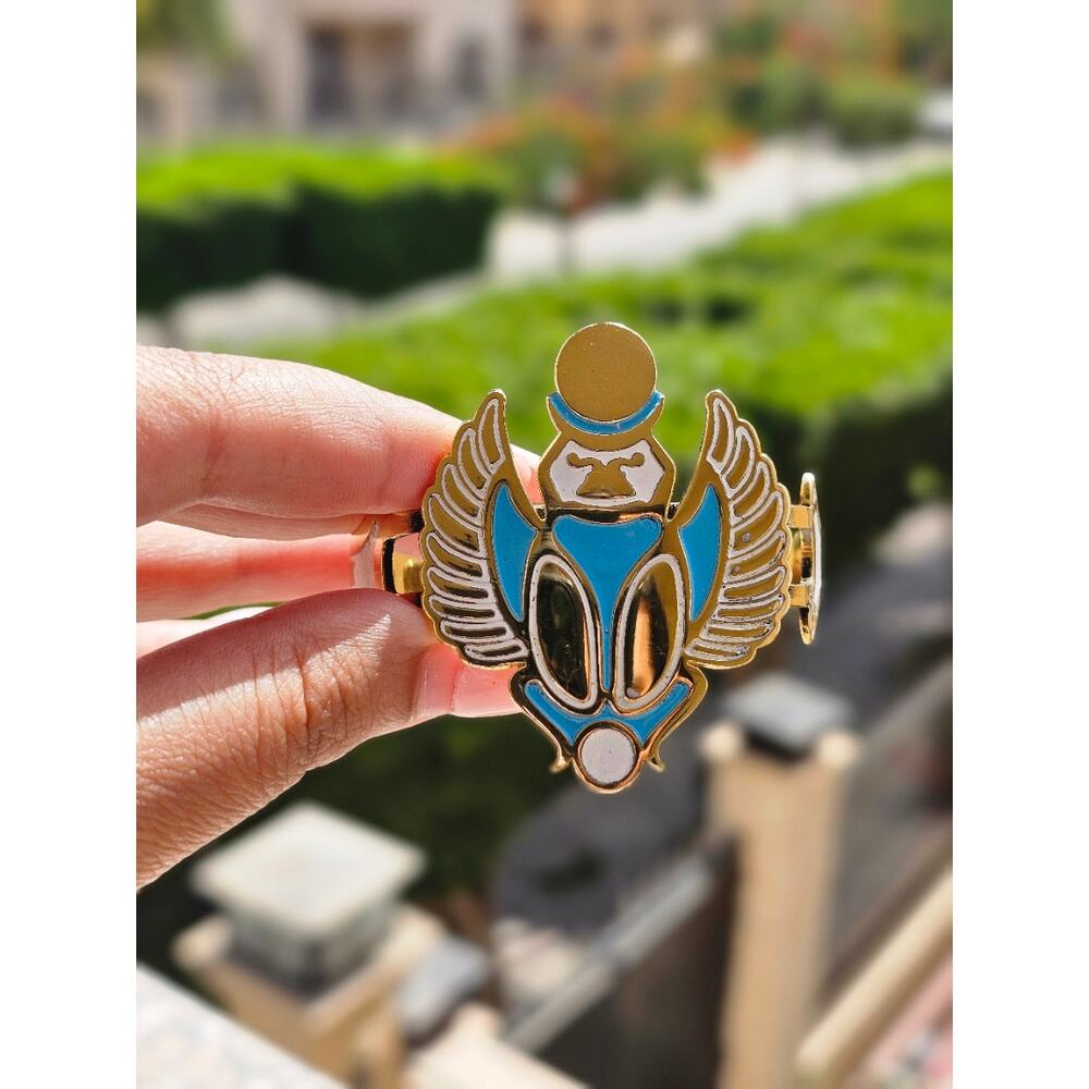 handmade winged scarab carrying the sun bangle